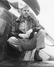 William Meredith sitting on a plane wing